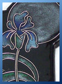 Faux cloisonne pendant with an iris design in Art Nouveau style
