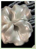 One-of-a-kind necklace with hand-sculpted polymer clay orchid beads